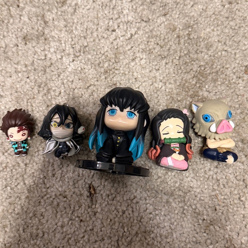 Multiple demon slayer mini figures
